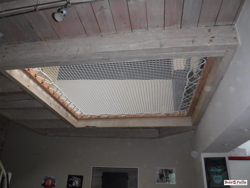 Création d'un vide sur séjour avec pose d'un filet en centre ville de Niort (79)